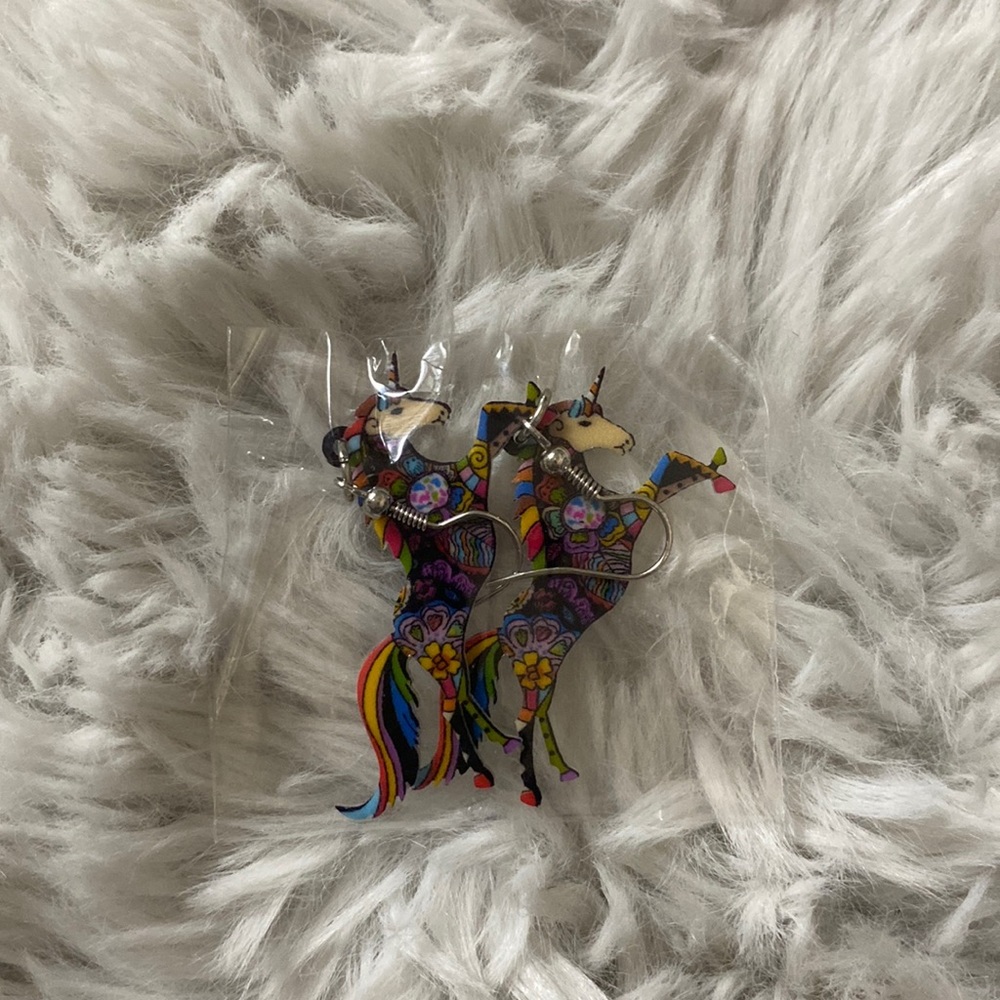 Horse earrings or could be unicorn earrings New in packaging